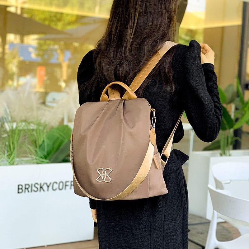 Celvera Tas Dames - Lichtgewicht Rugzak met Sierlijk Metalen Embleem en Contrast Bies | Casual