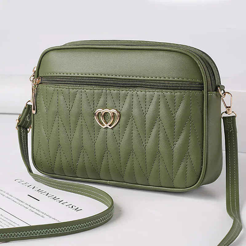 Celvera Tas Dames - Gewatteerde Crossbody met Hart Embleem en Rits | Casual