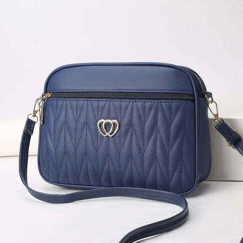 Celvera Tas Dames - Gewatteerde Crossbody met Hart Embleem en Rits | Casual