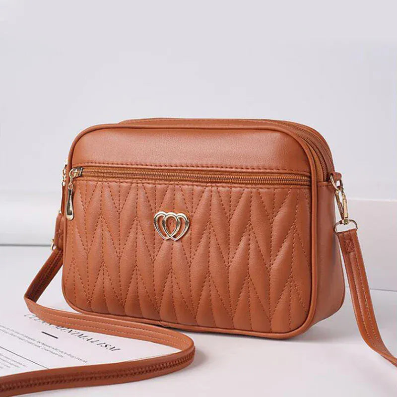 Celvera Tas Dames - Gewatteerde Crossbody met Hart Embleem en Rits | Casual
