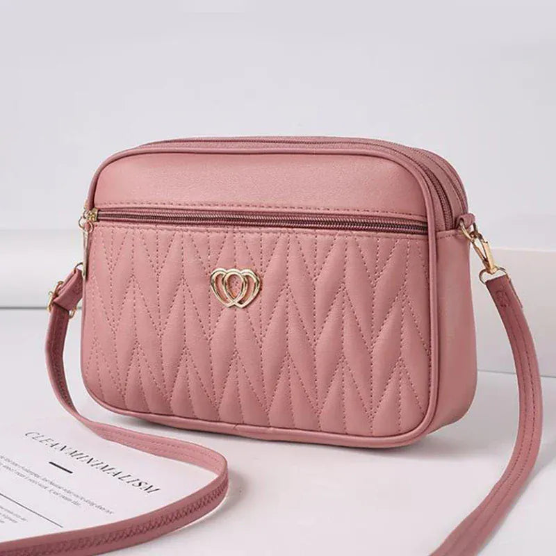 Celvera Tas Dames - Gewatteerde Crossbody met Hart Embleem en Rits | Casual