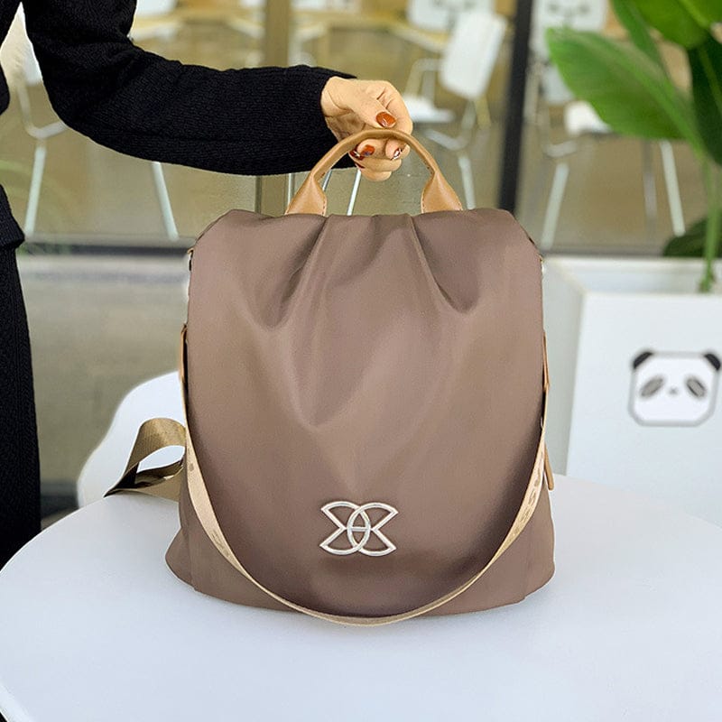Celvera Tas Dames - Lichtgewicht Rugzak met Sierlijk Metalen Embleem en Contrast Bies | Casual