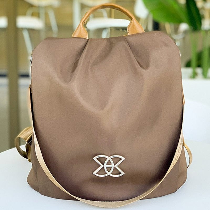 Celvera Tas Dames - Lichtgewicht Rugzak met Sierlijk Metalen Embleem en Contrast Bies | Casual