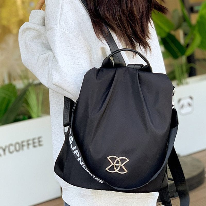 Celvera Tas Dames - Lichtgewicht Rugzak met Sierlijk Metalen Embleem en Contrast Bies | Casual