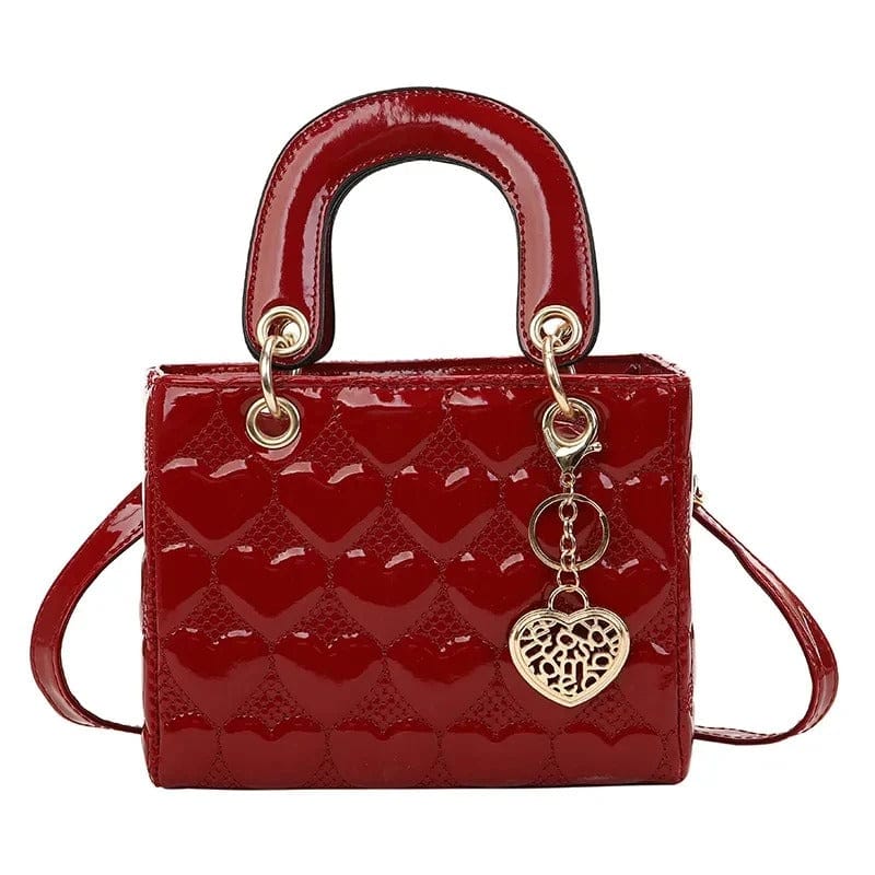 Celvera Tas Dames - Compacte Glanzende Handtas met Hartmotief en Gouden Hanger | Chique