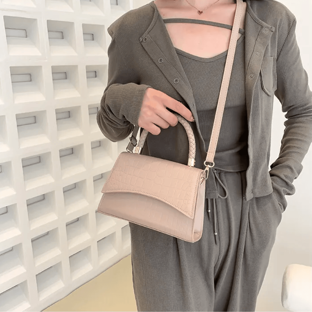 Celvera Handtas met gevlochten handvat en crossbodyband van PU-leer