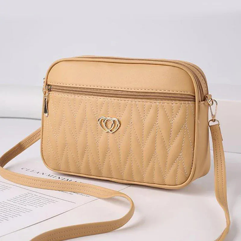 Celvera Tas Dames - Gewatteerde Crossbody met Hart Embleem en Rits | Casual