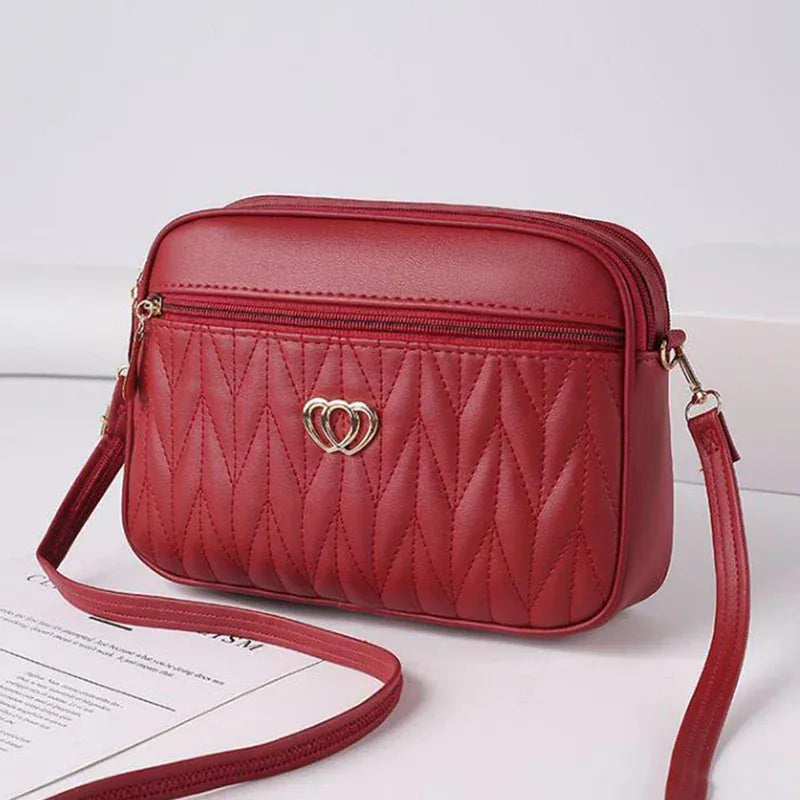 Celvera Tas Dames - Gewatteerde Crossbody met Hart Embleem en Rits | Casual