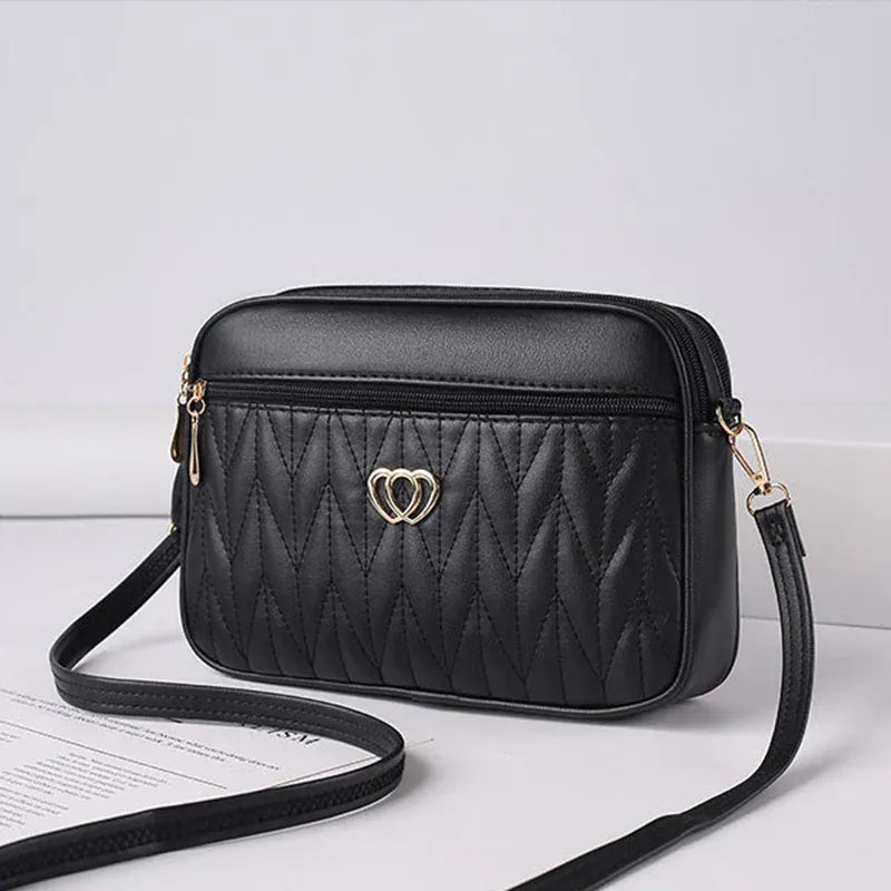 Celvera Tas Dames - Gewatteerde Crossbody met Hart Embleem en Rits | Casual