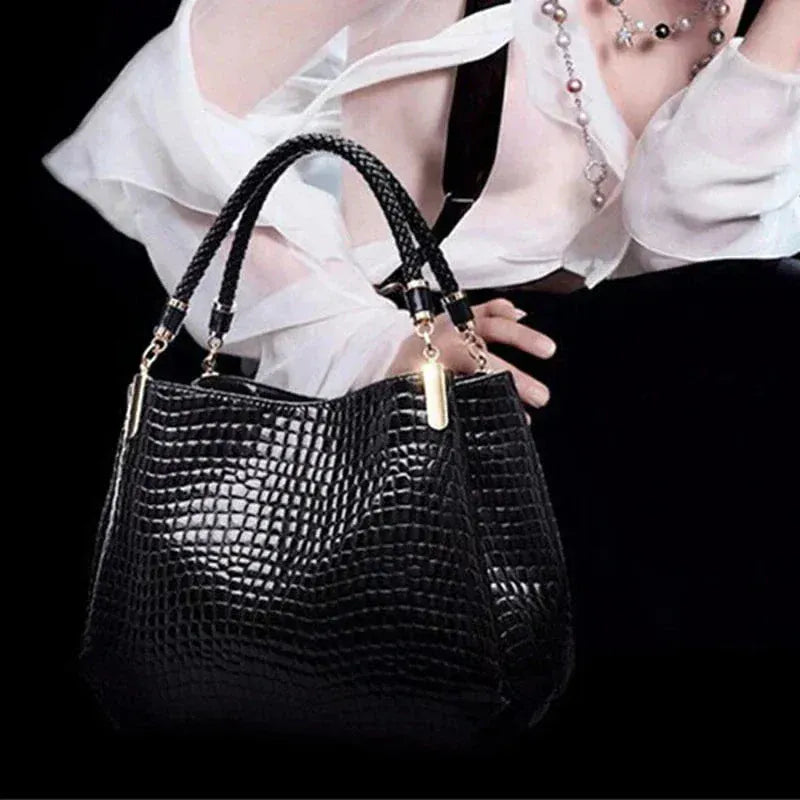 Celvera Tas Dames - Glanzende Handtas met Reliefstructuur en Gevlochten Handvat | Chic
